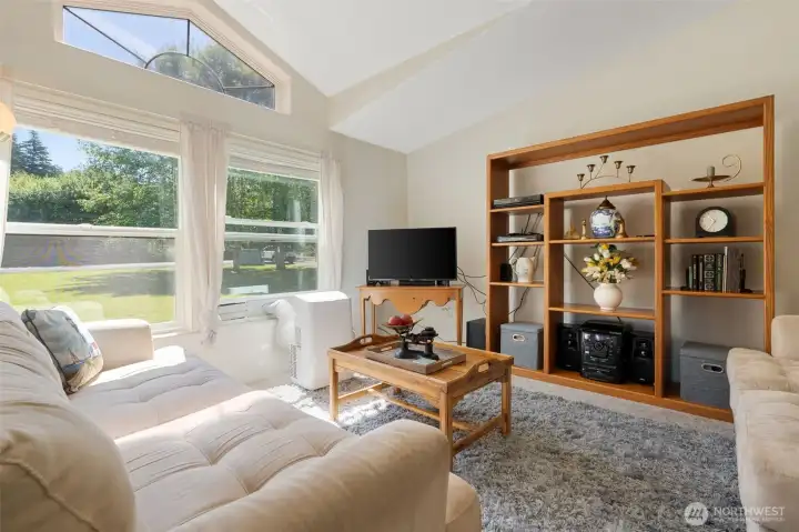 Living room with huge windows filling it with natural light Living room with huge windows filling it with natural light
