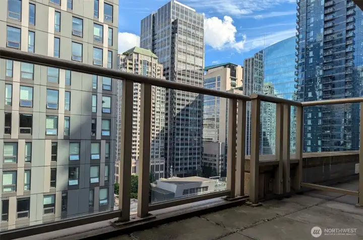 Balcony with access from living room and primary bedroom