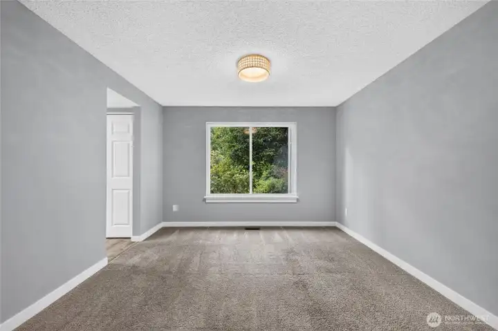 Generously-sized formal dining room accommodates larger tables!
