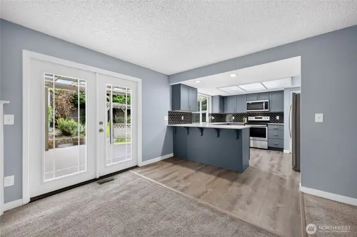 French doors lead to deck and outdoor entertainment areas!