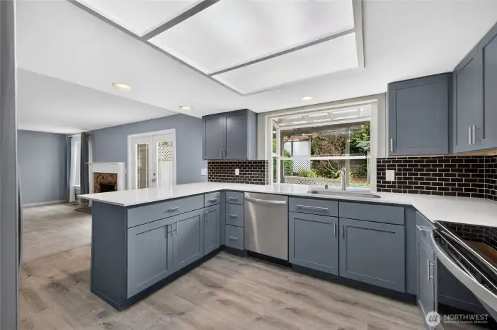 Roomy kitchen with updated cabinetry and quartz countertops!