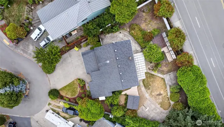 Over a quarter acre to stretch out on, with stategic plantings to surround this home with a sense of privacy!