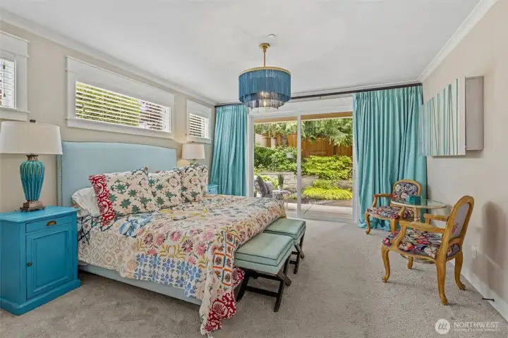 Main floor primary suite with private covered patio. Main floor primary suite with private covered patio.