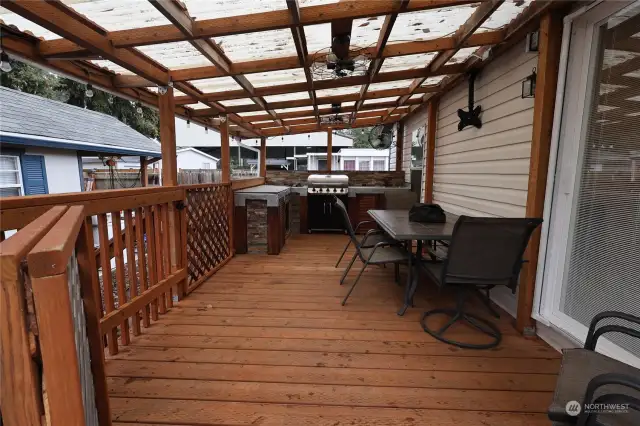 Outdoor kitchen with eating area.