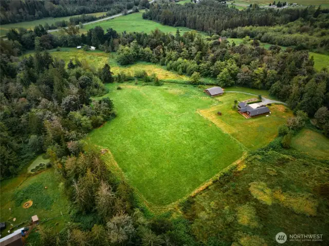 If comfort and a serene peaceful living are what you are searching for, this is it! Take in the natural beauty year round of the 7.71 private acres from this lovely covered patio. A perfect place to enjoy peaceful escape, yet just 5 minute drive from town & all amenities.