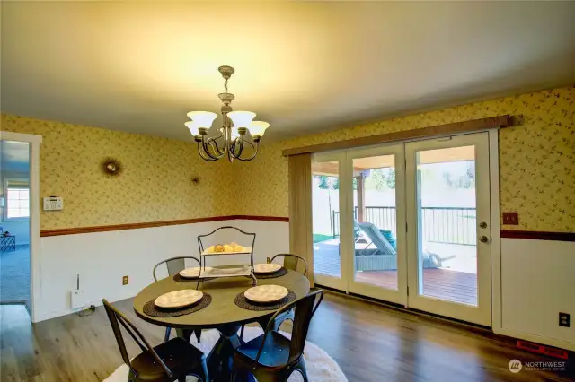 Kitchen open to covered patio.