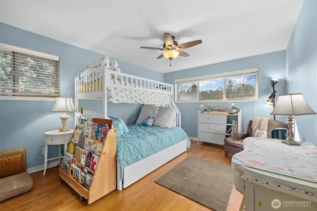 Bedroom, one of two on the main floor. Each bedroom has fitted closets for tidy storage.