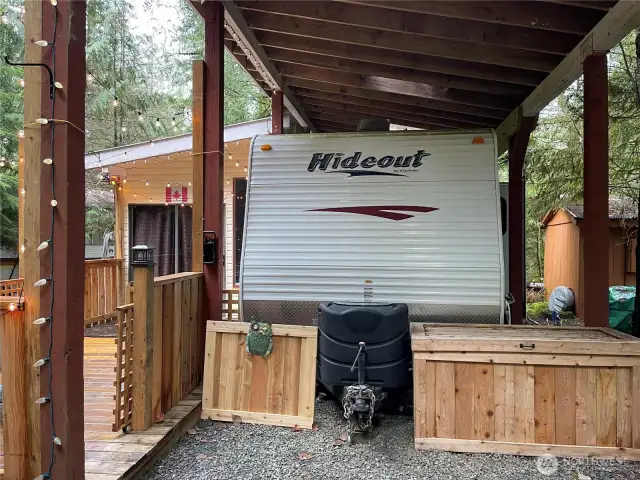Trailer sits under freestanding structure