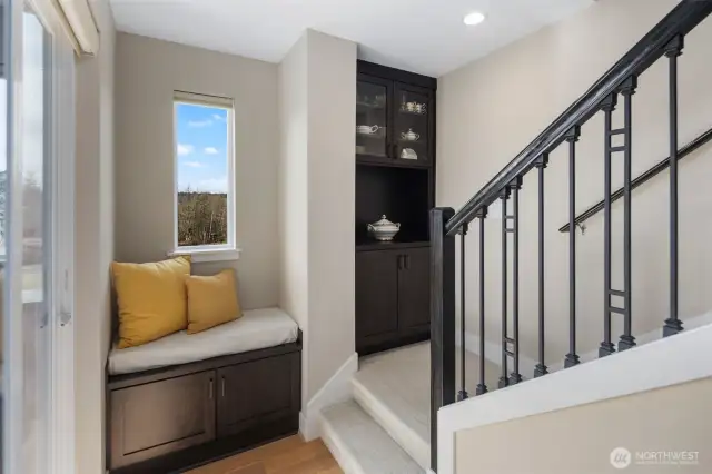Custom Built-in Window Seat and China Cabinet.  Upgraded Stair Railings and Baluster.  Added Stair Lighting.