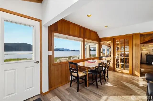 Dining area opens up to the outside deck.
