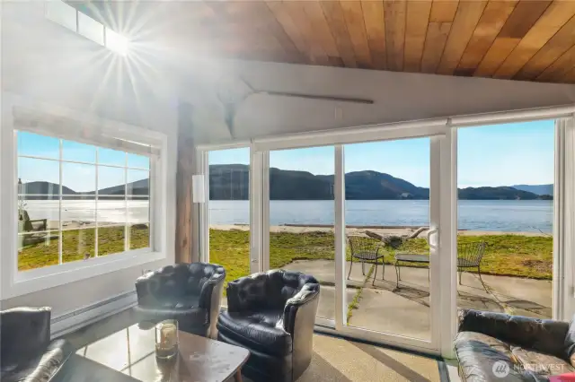 Walls of windows and doors frame the view.