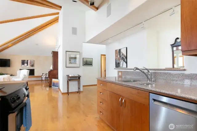 View from Kitchen to Living Area - Hall to Bedrooms Center Right
