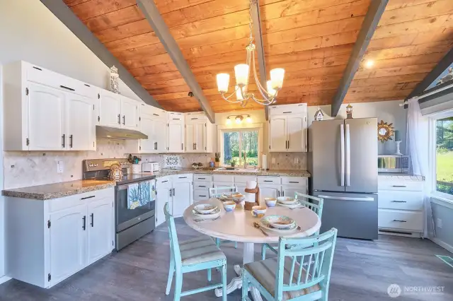 Beautiful granite counters and tiled backsplash