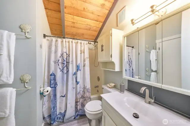 Bathroom with stackable full size washer/dryer