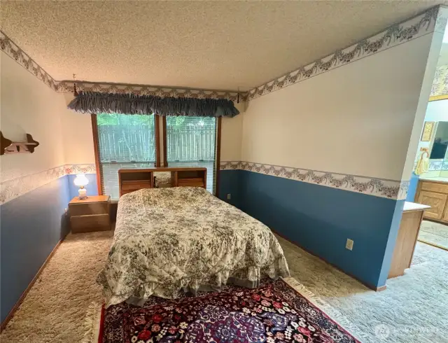 Primary bedroom with LARGE 3/4 bath and hot tub room!
