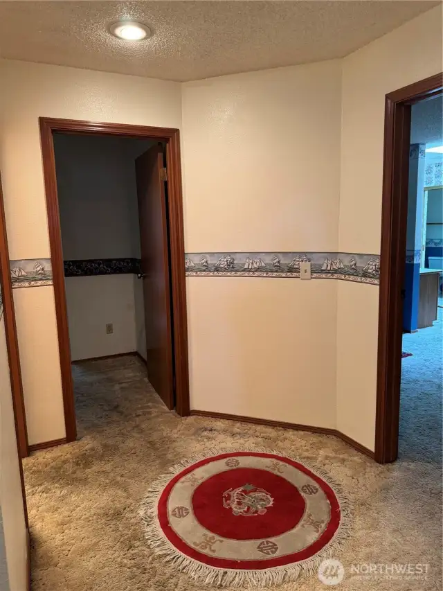 Space in between bedrooms, guest bath & utility room.