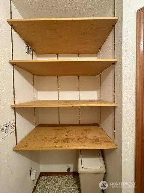 Shelves in the utility room are great for storage!