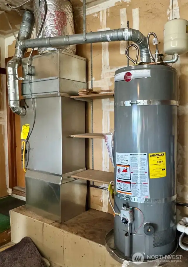 Gas furnace and Gas hot water heater located in attached 2 car garage.    WELCOME HOME1