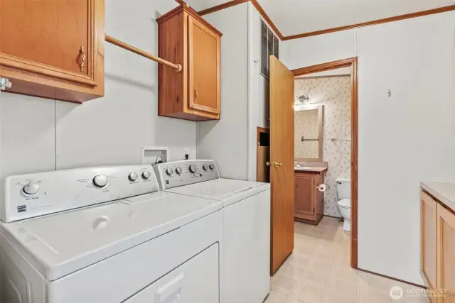 Laundry Room/Mud Room- w/d convey with sale (door to front deck)