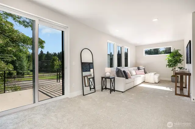 Loft or Media room or Game room with access to balcony.