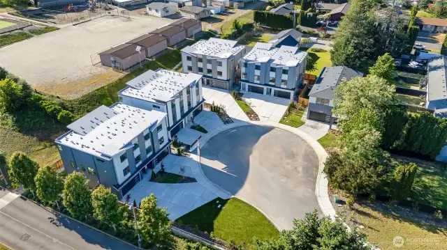 Aerial view of the Cul-de-sac community with views into the open grounds.