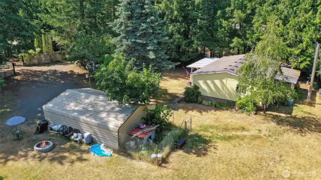 Carport has great dog run or garden space behind it.