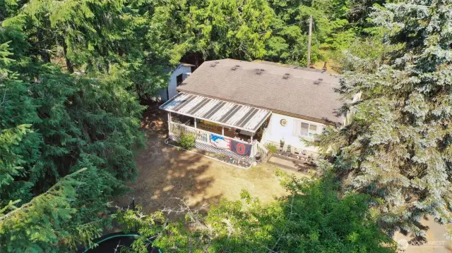 6321 nestled in the trees at the front of the property--also has a convenient shed seen here.