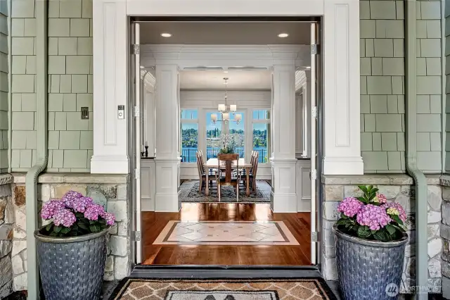 The inviting entry opens straight into the dining room with French doors opening straight to the east facing deck.