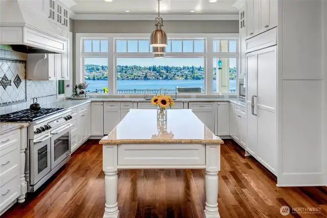 A true chef's kitchen filled with natural light, top of the line appliances and those stunning views.