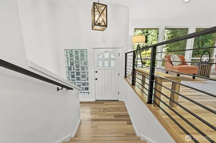 Large entry stairway -Updated Open Railing Extends the Living Space