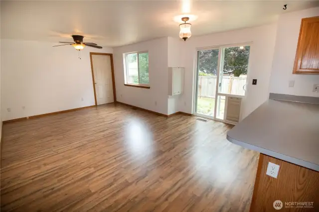 The kitchen flows into the living/dining room.