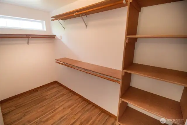 Tons of storage in the primary walk-in closet!