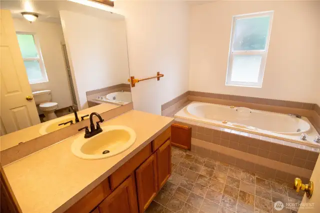 The primary ensuite with jetted soaking tub!