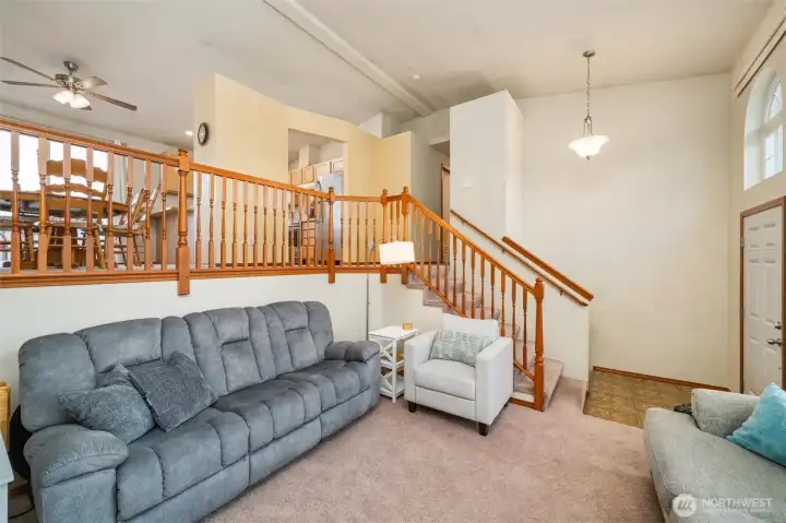 Living area open to dining and kitchen