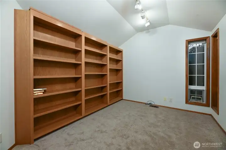 Main floor office w/ built in shelving