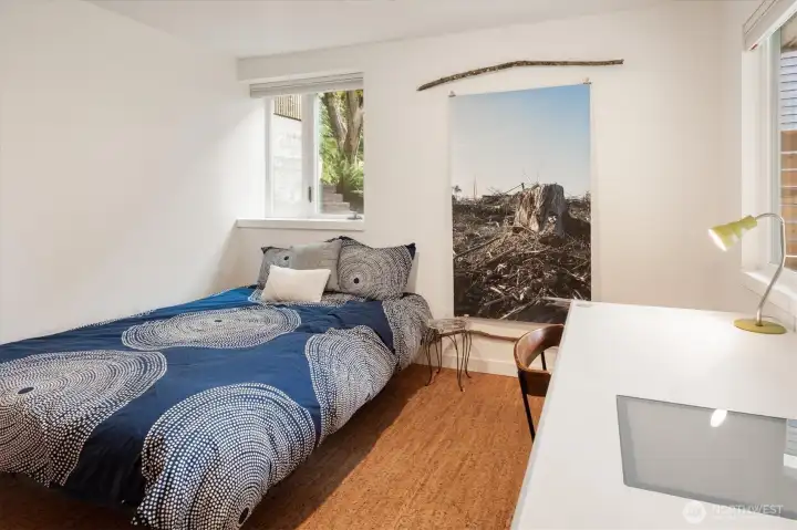 Find a fourth bedroom on the lower level, adding invaluable options for guests and residents alike