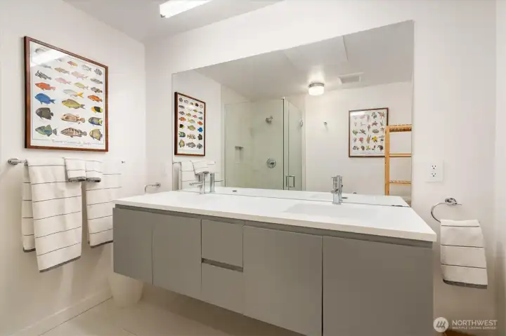 The ¾ bathroom on the lower level is yet another example of the thoughtful design that fills this stylish home.