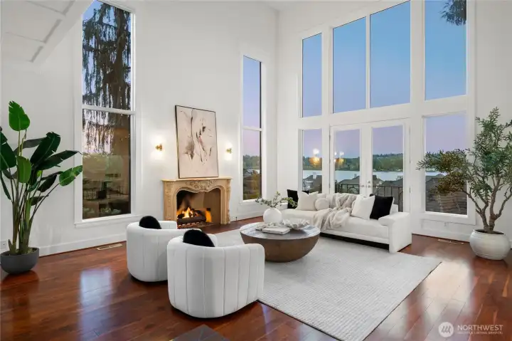 Nearly 20' ceilings and lake views welcome you from the great room