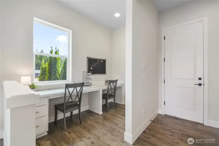 Convenient office/student space tucked away on main level