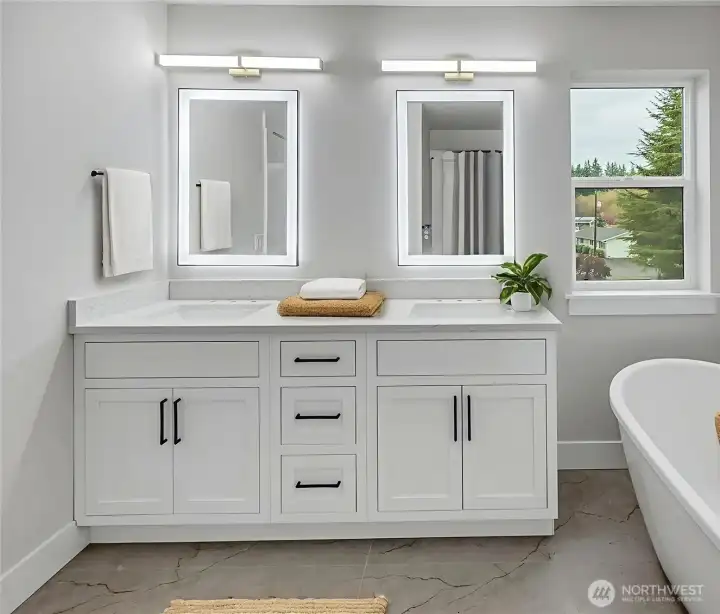 Primary bathroom has double vanity, soaking tub, ceramic tiled shower, and smart toilet. Virtually staged