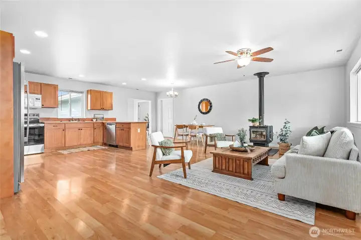 Welcoming entry opens into spacious living room & large open eat-in kitchen.