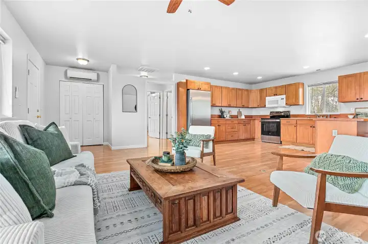 Looking back toward entry - notice HP split, coat closet & access to owner's suite just off kitchen
