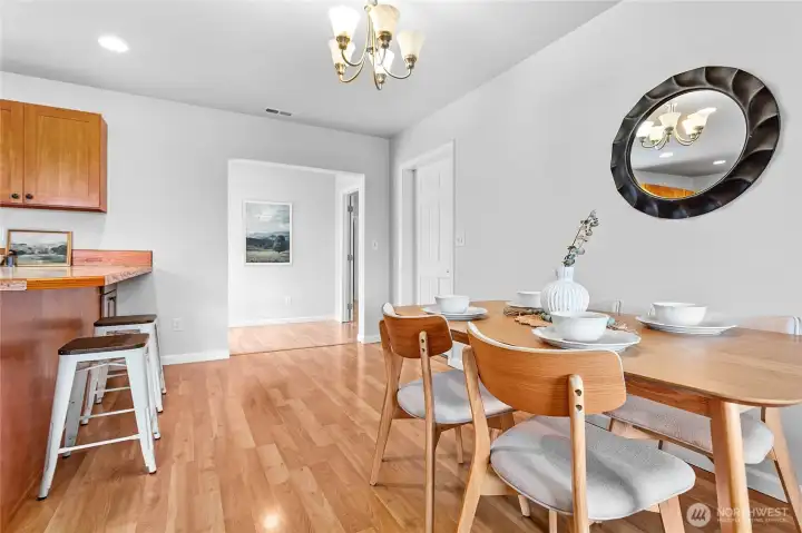 Garage entrance through door to right. Walkway leads to slider for backyard access & rest of home