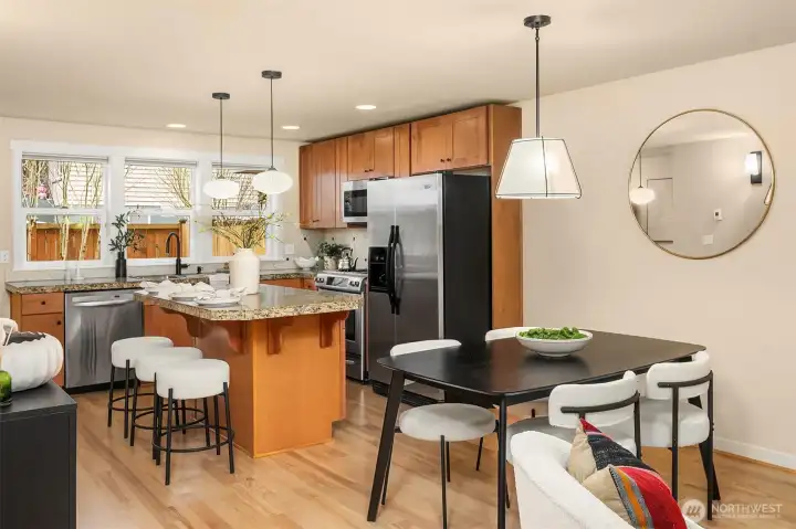 Dining room plus bar seating at the kitchen island