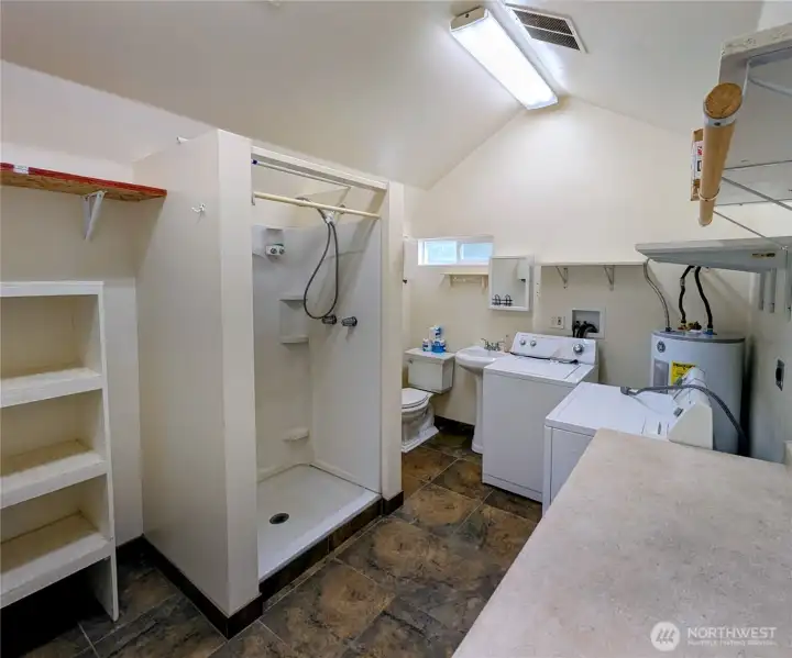 3/4 bath with washer dryer and water hook up for 2nd fridge