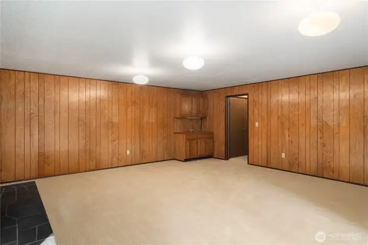 A view of the spacious lower level rec room. Think Seahawk & Mariners games, ping pong, movie theatre, and a place to make memories.