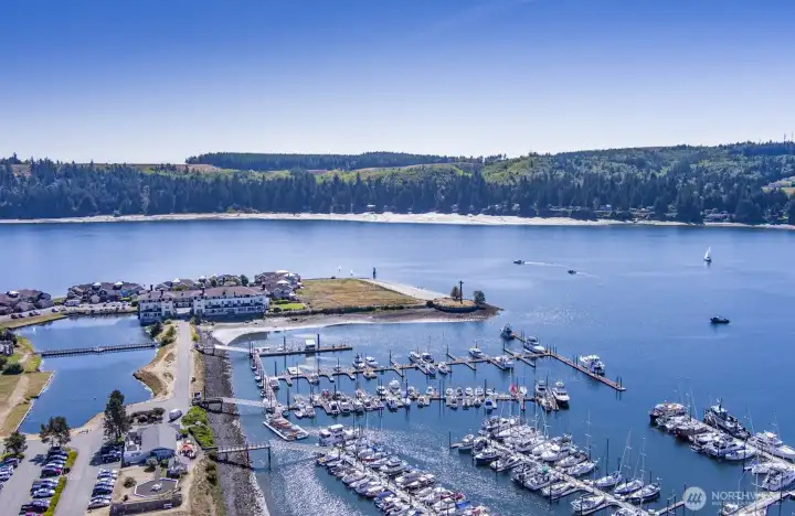 The beautiful Inn at Port Ludlow and the public 300-slip marina with a fuel dock in Port Ludlow Bay.