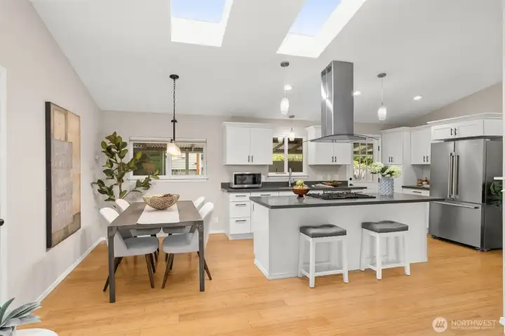 updated kitchen with stone counters and new appliances