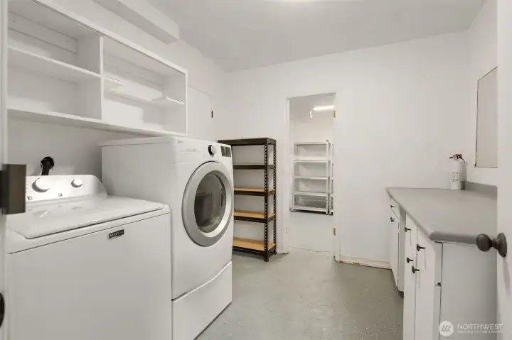 laundry is off the kitchen in area by garage