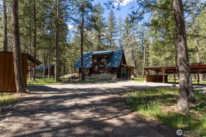 The compound! House, shed, container with carport, and 3 bay carport. What more could you need?!